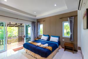 Ein Bett oder Betten in einem Zimmer der Unterkunft Nature Line Resort
