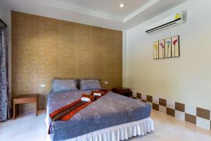 Ein Bett oder Betten in einem Zimmer der Unterkunft Nature Line Resort