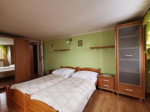 Posteľ alebo postele v izbe v ubytovaní Willa Hamernik AGROTURYSTYKA