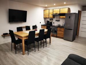 Kuchyňa alebo kuchynka v ubytovaní Apartamenty Artur