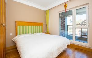 Fotografie z fotogalerie ubytování Songhua Lake Qingshan Snow View Apartment v destinaci Jilin