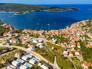 an aerial view of a city and the water at Luxury Blue Villas Vis in Vis
