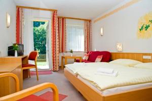 Postel nebo postele na pokoji v ubytování Stadthotel Raabs an der Thaya