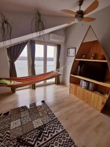 Postel nebo postele na pokoji v ubytování Gardos riverview