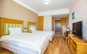 Fotografie z fotogalerie ubytování Songhua Lake Qingshan Snow View Apartment v destinaci Jilin
