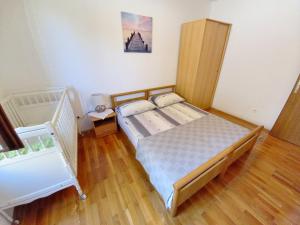 Posteľ alebo postele v izbe v ubytovaní Apartment Toni Valbandon
