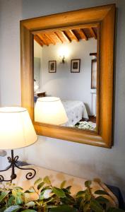 Postel nebo postele na pokoji v ubytování B&B Antiche Rime