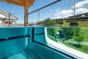 Balkón nebo terasa v ubytování SCHWARZENBACH - Apartments & Rooftop Pool