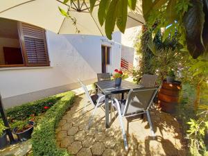 Vonkajšia záhrada v ubytovaní Apartment Toni Valbandon