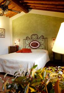 Postel nebo postele na pokoji v ubytování B&B Antiche Rime