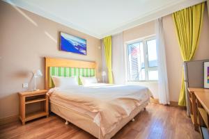 Fotografie z fotogalerie ubytování Songhua Lake Qingshan Snow View Apartment v destinaci Jilin