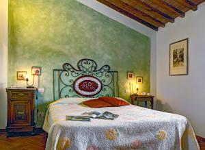 Postel nebo postele na pokoji v ubytování B&B Antiche Rime