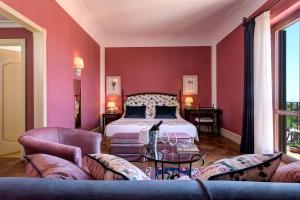 Hotel Baglio Oneto dei Principi di San Lorenzo - Luxury Wine Resort客房内的一张或多张床位