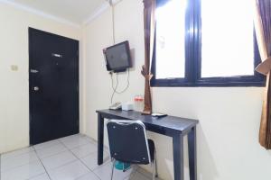 TV a/nebo společenská místnost v ubytování AMS Hotel Koja + 21 fotografií