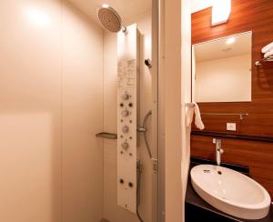 a bathroom with a toilet and a sink at Comfort Inn Tokyo Roppongi in Tokyo