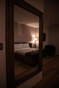 Llit o llits en una habitació de Castello di Pandora
