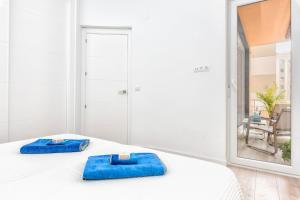 Posteľ alebo postele v izbe v ubytovaní Pinzon Apartment in Malaga by Solaga Holiday Homes