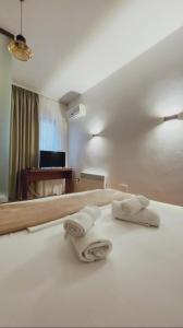 TV a/nebo společenská místnost v ubytování ODA Guest House