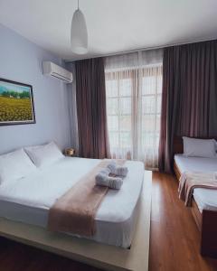 Кровать или кровати в номере ODA Guest House