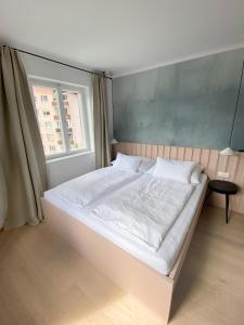 Łóżko lub łóżka w pokoju w obiekcie Appartements Steiner - SKI IN - SKI OUT