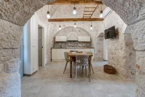 A kitchen or kitchenette at Trulli in Vigna