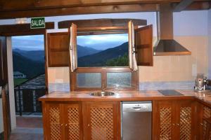 A kitchen or kitchenette at Apartamento La Casa del Abuelo Justo