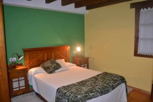 A bed or beds in a room at Apartamento La Casa del Abuelo Justo
