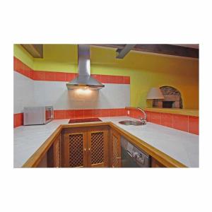 A kitchen or kitchenette at Apartamento La Casa del Abuelo Justo