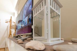 A television and/or entertainment centre at Don Fulippu Home to city center