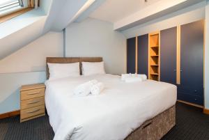 מיטה או מיטות בחדר ב-Mountsorrel House - Spacious 5bed in Leicester Ideal for Families and Contractors