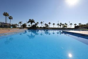Bazén v ubytování Malaga Paradise Home nebo v jeho okolí