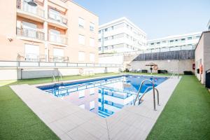 Bazén v ubytovaní Serrallo Apartment alebo v jeho blízkosti