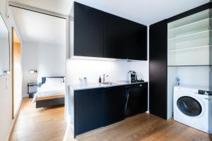 Krevet ili kreveti u jedinici u okviru objekta SET Hotel.Residence by Teufelhof Basel