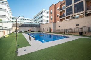 Bazén v ubytovaní Serrallo Apartment alebo v jeho blízkosti