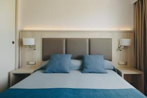 Posteľ alebo postele v izbe v ubytovaní Hotel Ivory Playa Sports & Spa