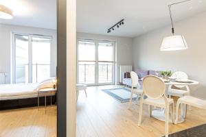 Ένα ή περισσότερα κρεβάτια σε δωμάτιο στο Apartament Koncertowy