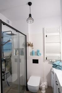 Kúpeľňa v ubytovaní Apartament Pastelove Kołobrzeg