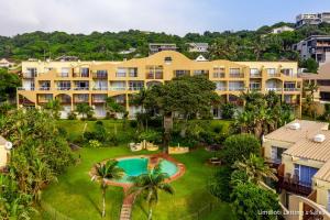 an aerial view of a resort with a swimming pool at Twin Tide Duplex in Umdloti