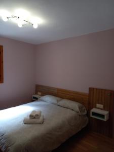Postel nebo postele na pokoji v ubytování Apartamentos Tuara