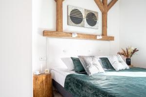 Posteľ alebo postele v izbe v ubytovaní Apartament Onyks