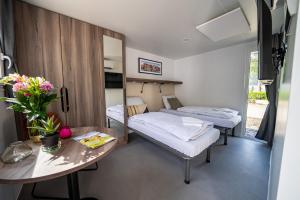 EuroParcs Het Amsterdamse Bos客房内的一张或多张床位