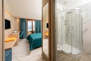 Koupelna v ubytování Hotel Porto Roca