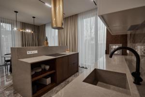 Ett badrum på Kostjukowski Apartments Avalon