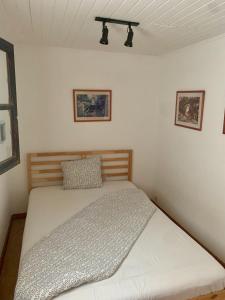 En eller flere senge i et værelse på Finca Gerardo Miraflor