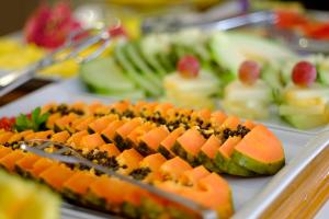 a plate of food on a table with sushi at miKasa Agua Amarga & SPA in Agua Amarga