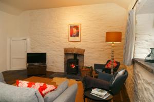 Posezení v ubytování The Cottage at Noyadd Trefawr - Grade II*