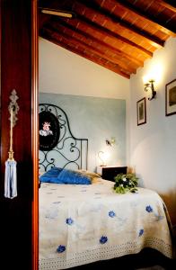 Postel nebo postele na pokoji v ubytování B&B Antiche Rime
