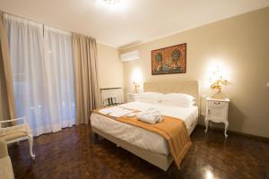 Postel nebo postele na pokoji v ubytování Villa Jasmine B&B