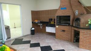A cozinha ou cozinha compacta de PARAISO DO ALEXANDRE para 15 hóspedes