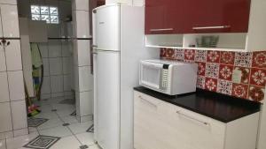 A cozinha ou cozinha compacta de PARAISO DO ALEXANDRE para 15 hóspedes